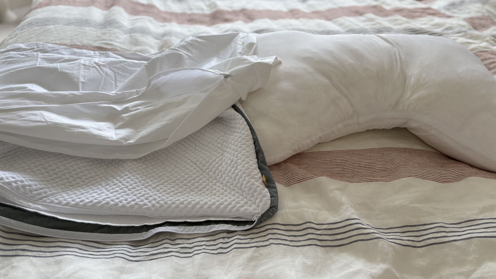 Testing the Eli &amp;amp; Elm Ultimate Side Sleeper Pillow, showing it on the bed