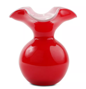 Red fluted glass vase.