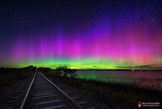 Night sky photographer Mike Taylor captured this spectacular view of auroras over Unity Pond in Waldo County, Maine on Sept. 12, 2014. The northern lights were amplified by intense solar storms earlier in the week.