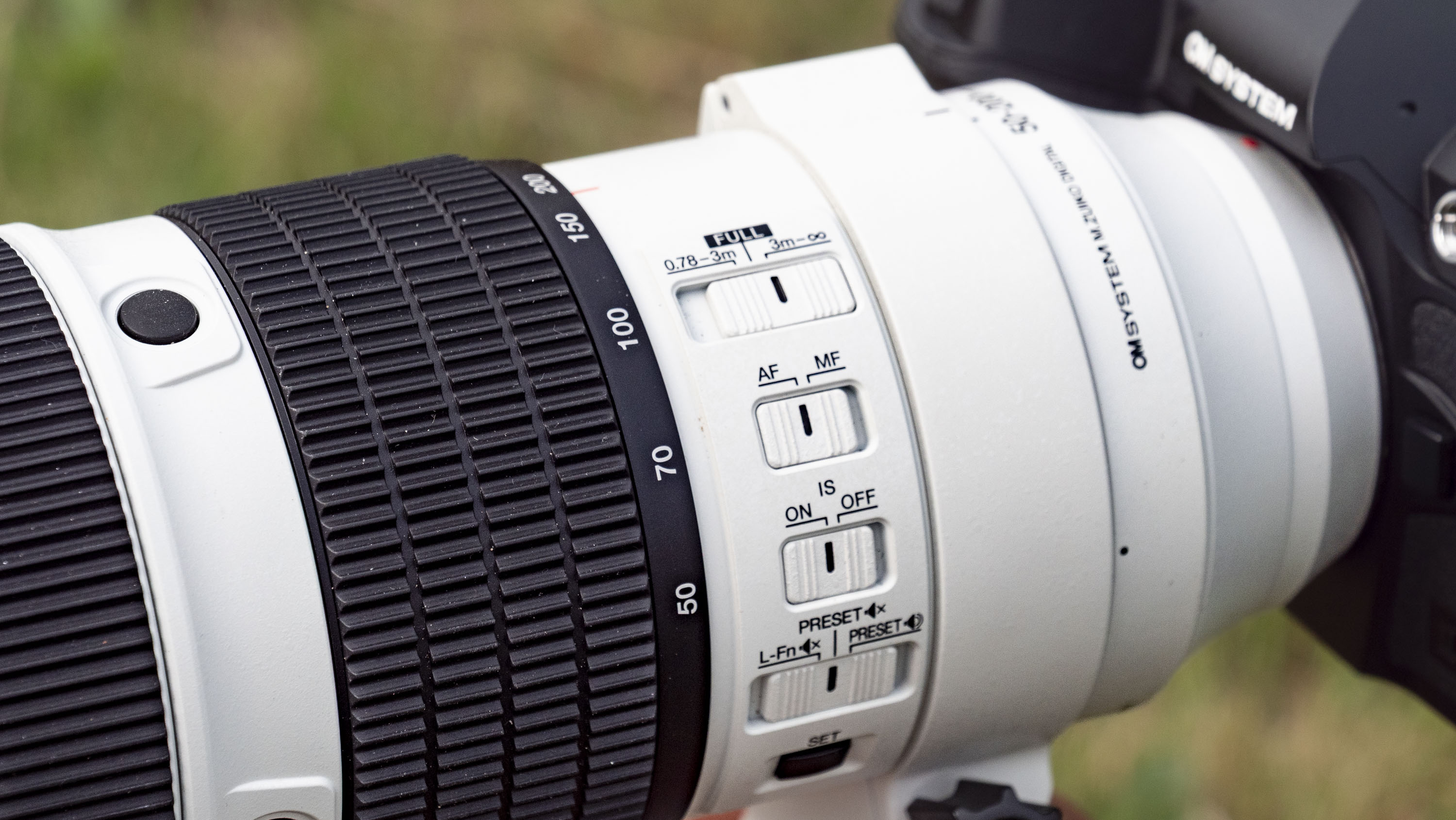 Close up of the OM System M.Zuiko Digital ED 50-200mm F2.8 IS Pro lens's controls