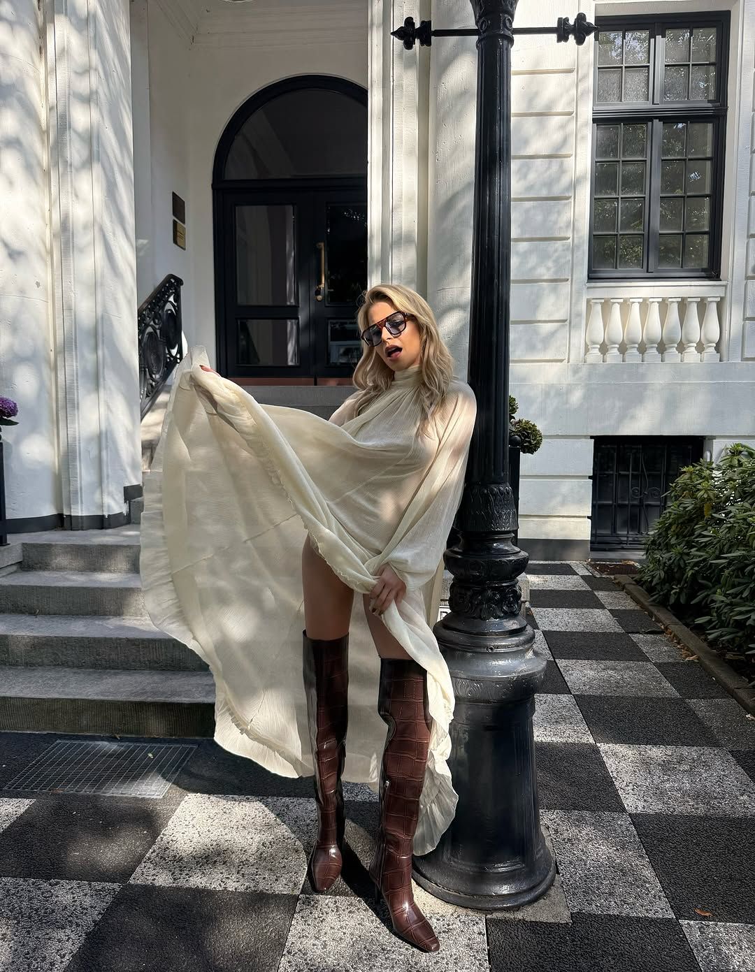 woman wearing over the knee boot outfit 2026