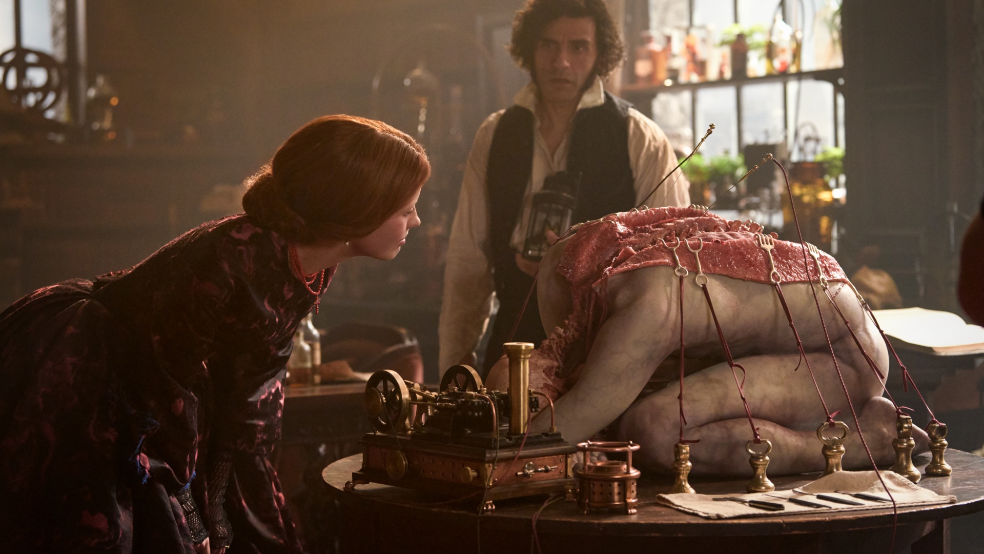 Mia Goth as Elizabeth Harlander and Oscar Isaac as Victor Frankenstein in Frankenstein