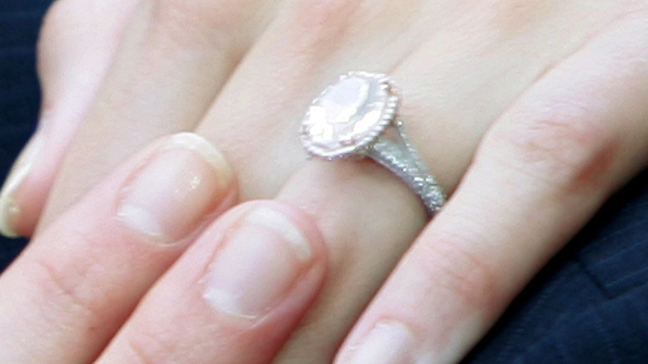 LONDON - JUNE 19:The engagement ring of actress Katie Holmes is seen as she arrives with actor Tom Cruise at the UK premiere of &amp;quot;War Of The Worlds&amp;quot; at the Odeon Leicester Square June 19, 2005