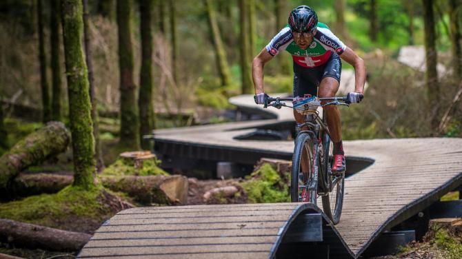Christoph Sauser on a boardwalk section