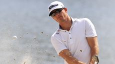 Morgan Hoffmann hits a bunker shot