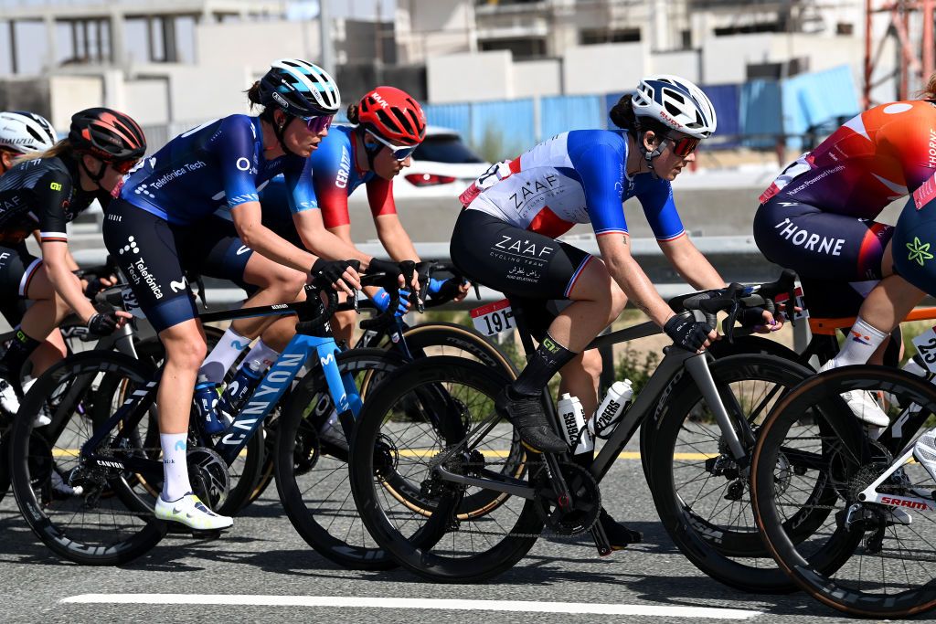 DUBAI UNITED ARAB EMIRATES FEBRUARY 09 LR Aude Biannic of France and Movistar Team and Audrey Cordon Ragot of France and Zaaf Cycling Team compete during the 1st UAE Tour Women 2023 Stage 1 a 109km stage from Port Rashid to Dubai Harbour UAETourWomen on February 09 2023 in Dubai United Arab Emirates Photo by Tim de WaeleGetty Images