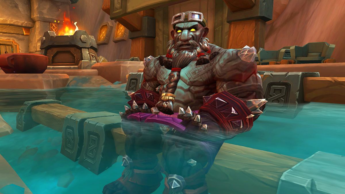 An Earthen character sitting in a pool in World of Warcraft The War Within