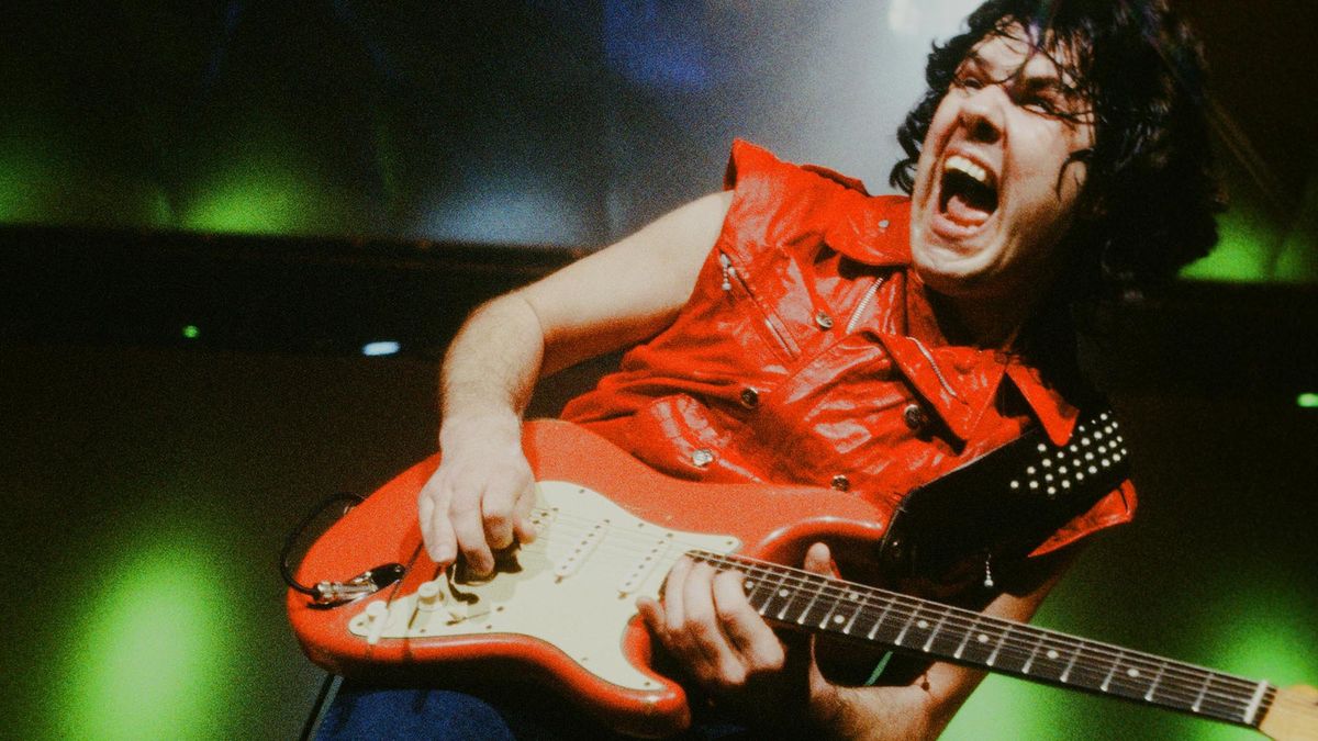 Gary Moore goes wild with a red Stratocaster