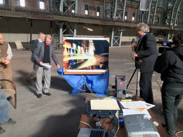 Jack Simes unveils the design of the New York 6 Day velodrome at a press conference within the Kingsbridge Armory