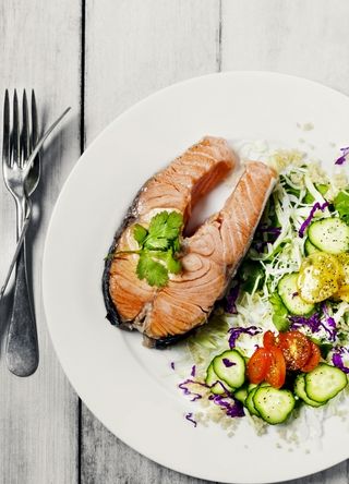 Salmon steak and salad