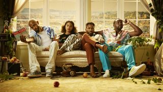 The cast of Atlanta sitting on a couch