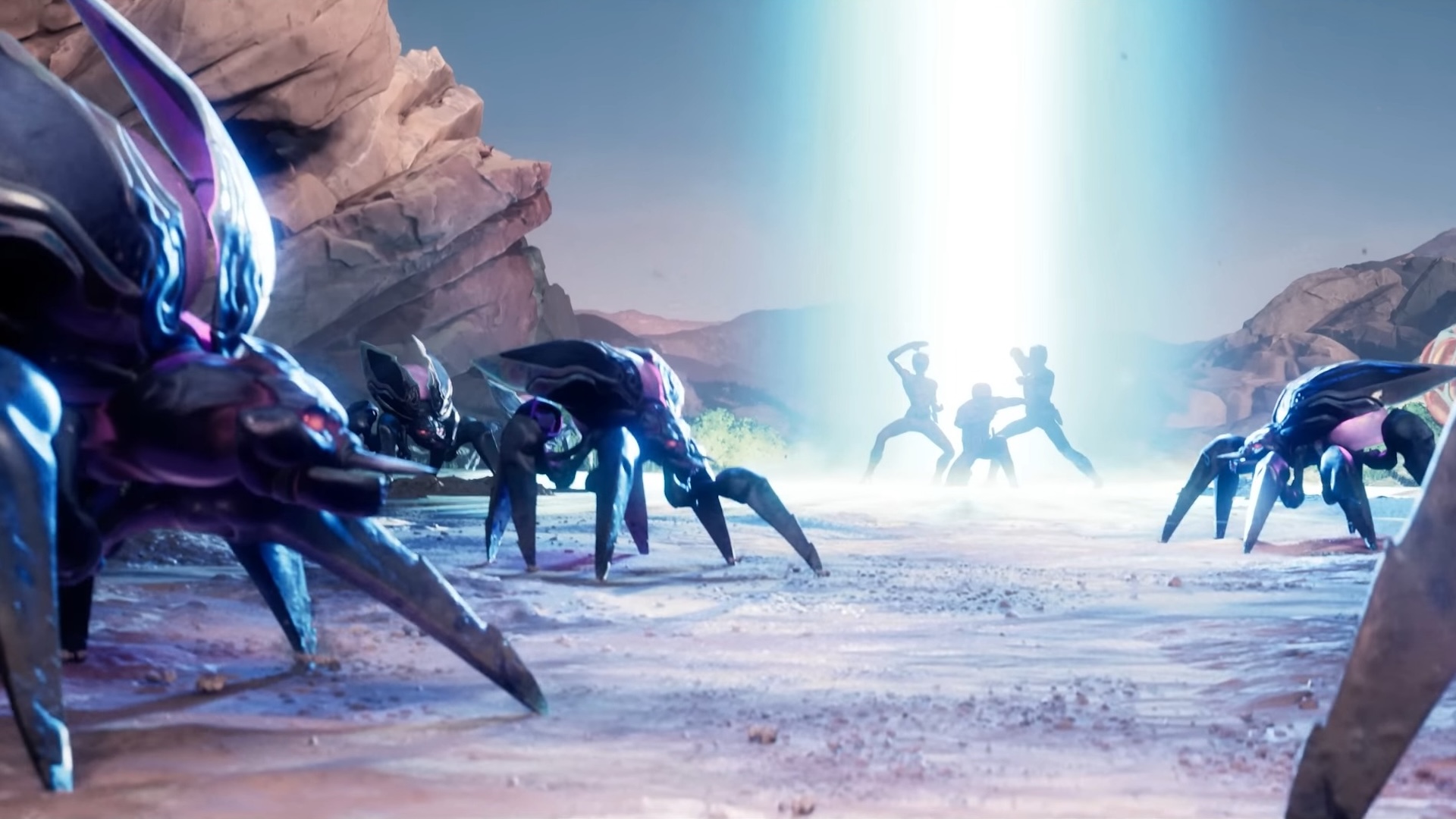 The Power Rangers arrive in a beam of light as bugs approach all around them