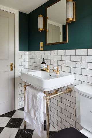 Interior designer Nicola Miller used clever tricks to create s stylish loft en suite in Leo and Tamsin's Herne Hill home