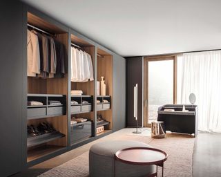 large closet with hanging space and shelving