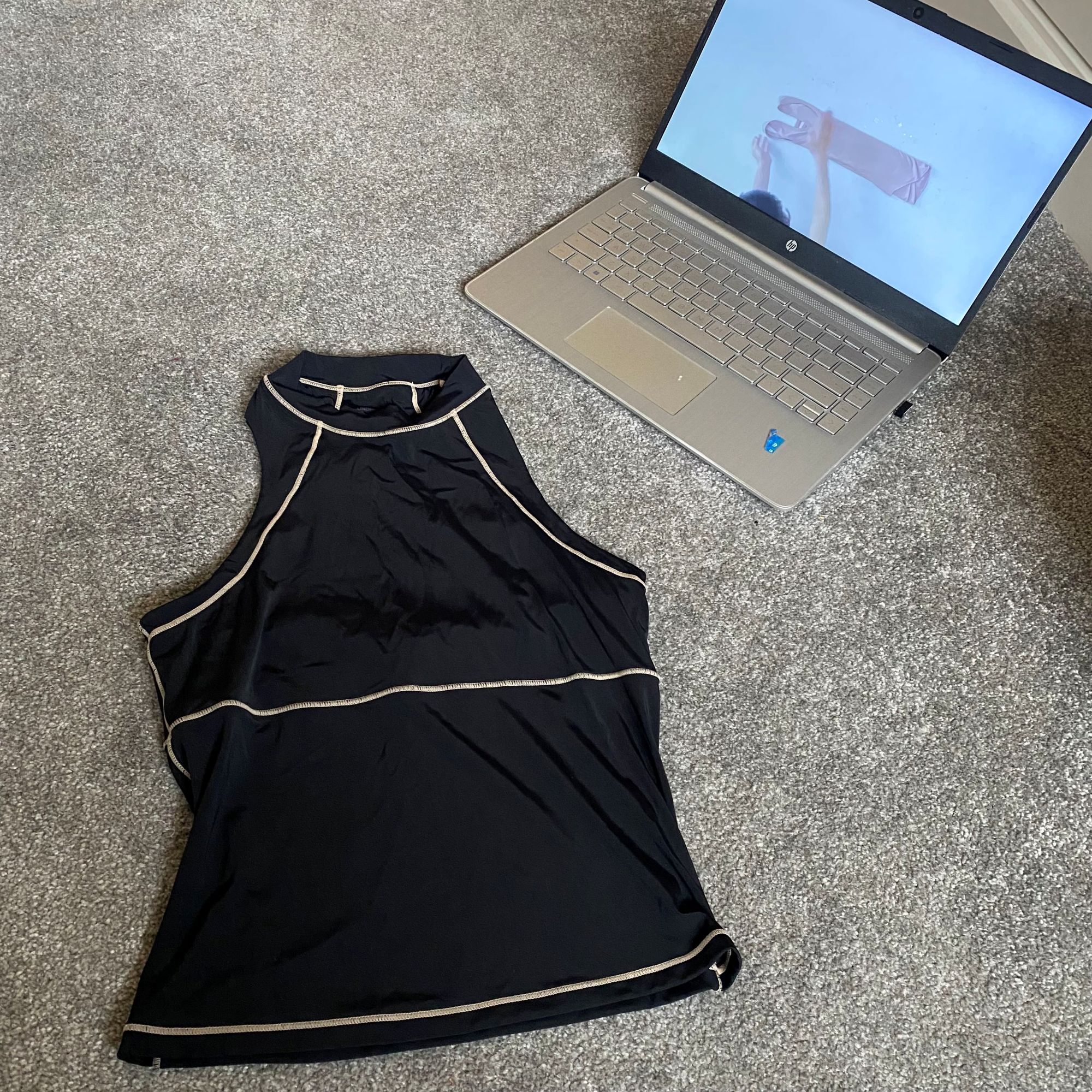 Katie trying the KonMari folding method to organise her clothes