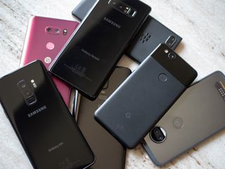 Pile of Android smartphones