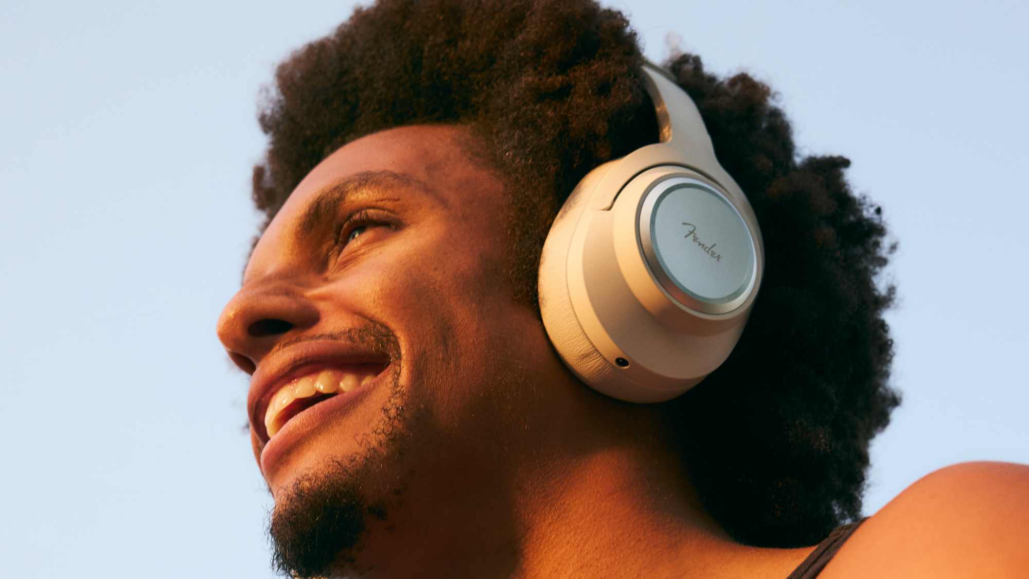 The Fender Mix headphones on a man's head.