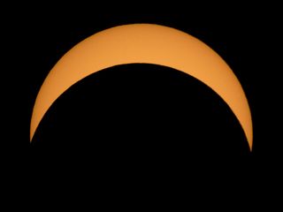 The moon partially obscures the sun during the total solar eclipse of Aug. 21, 2017 in this NASA photo by Bill Ingalls. On Aug. 11, 2018, a partial solar eclipse will be visible most of Asia, far northern Europe, Iceland and Greenland, as well as from a s