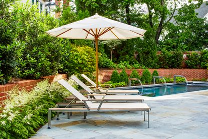 pool sun lounger umbrella