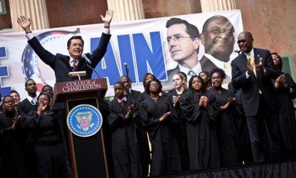 Colbert holds a rally with former Republican presidential candidate Herman Cain on Jan. 20 in Charleston, S.C.