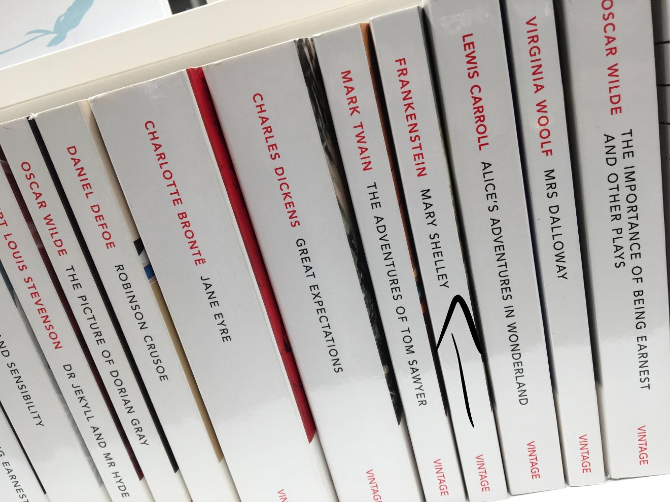 A collection of Vintage book spines with the author and title the wrong way round on Frankenstein