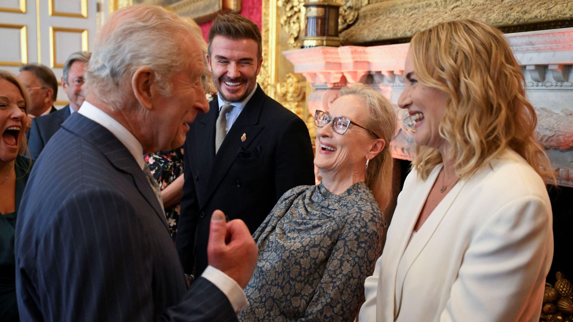 Meryl Streep laughs at a joke King Charles has made at the King's Foundation charity awards, alongside Kate Winslet and David Beckham