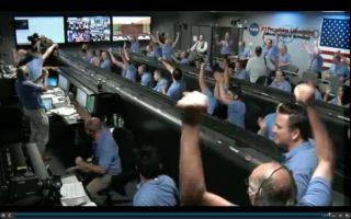 JPL technicians react to the news that Curiosity has landed on Mars, August 6, 2012.