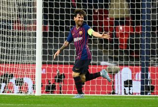 Lionel Messi celebrates after scoring for Barcelona against Tottenham, 2018