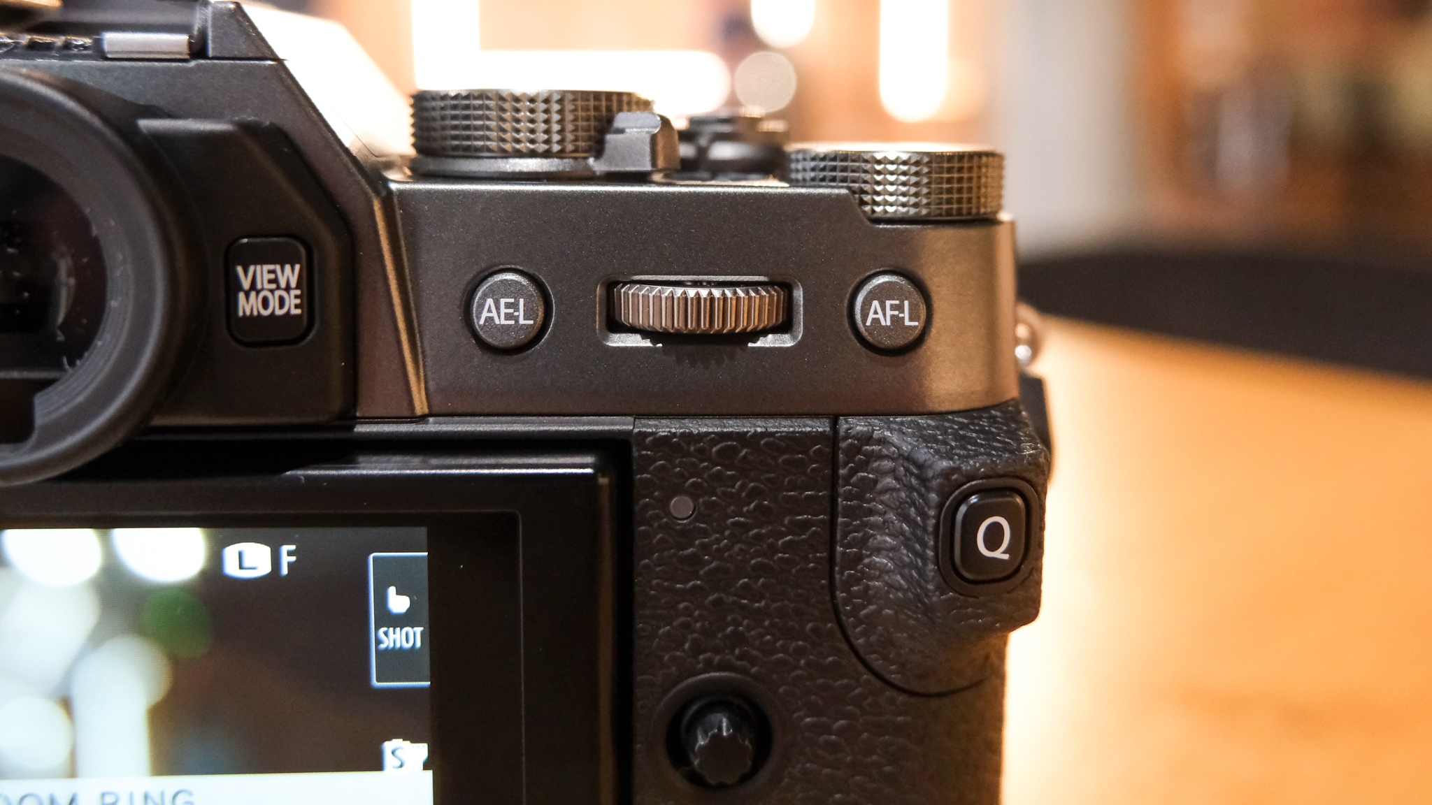A charcoal Fujifilm X-T30 III mirrorless camera