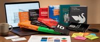 set of branding books on a table