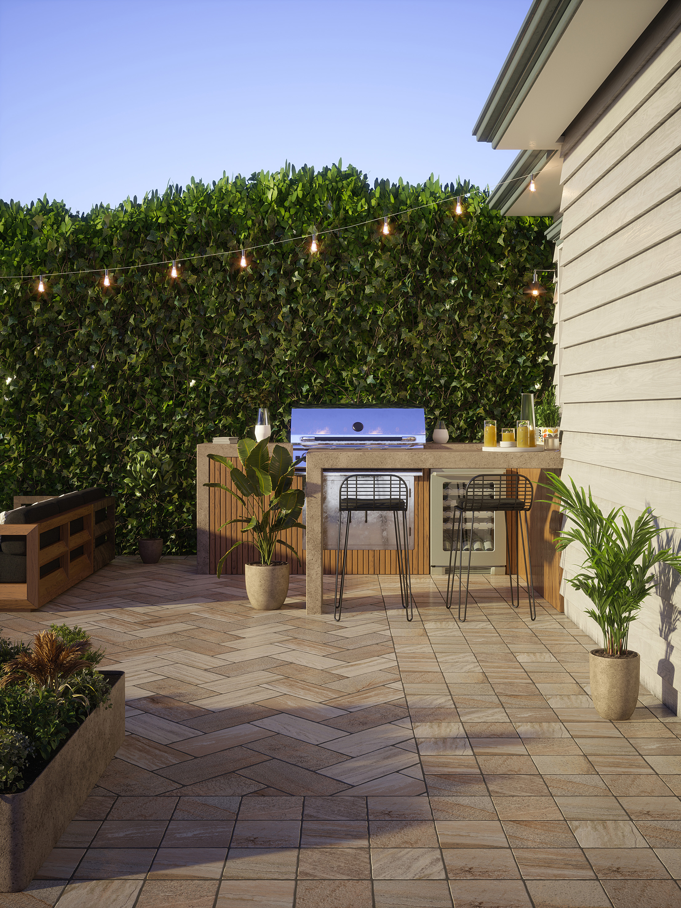 A tiled deck, with a built in grill, and a tall breakfast bar with chairs
