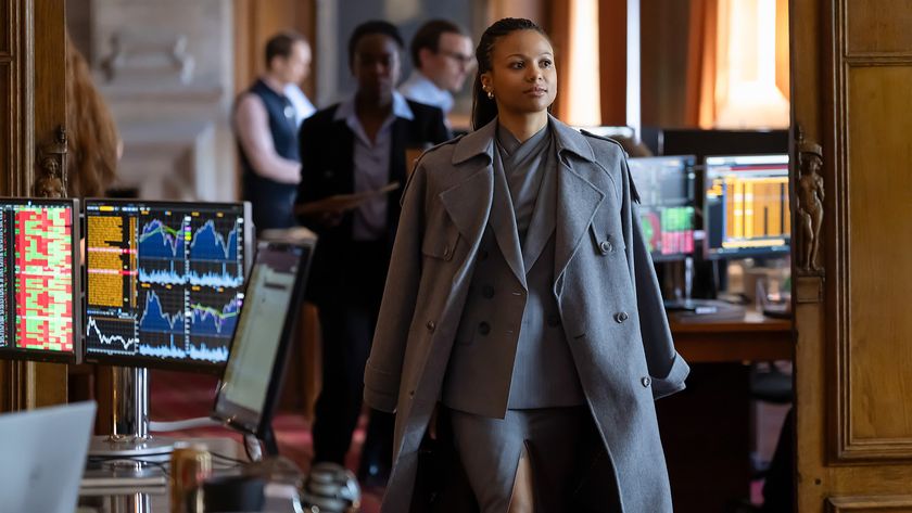 Harper walking through an office space in Industry season 4