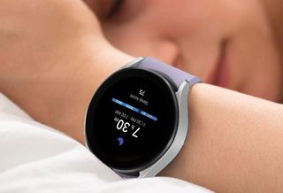 a girl wears a Galaxy Watch 5 which is tracking her sleep