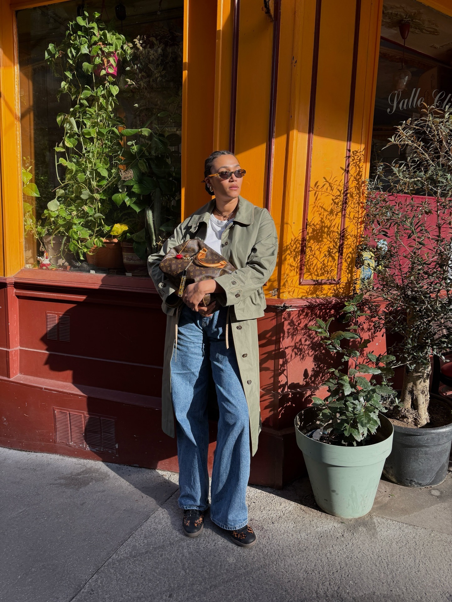 @lenafarl wearing animal-print sneakers