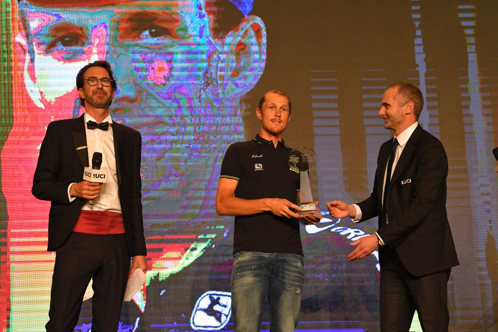 Simon Yates could not attend so teammate Matteo Trentin had to accept his award