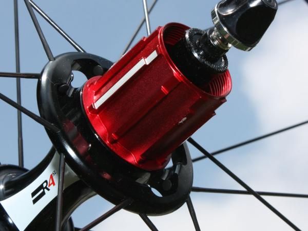 The R4SL alloy freehub body's group-specific spline patterns save as much weight as possible. Though this Shimano 10spd version looks fairly standard, the SRAM Red driver's midsection is completely barren