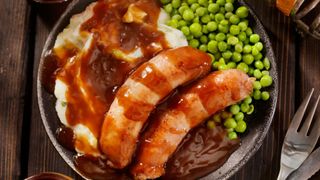 Sausage and mash with mushy peas and gravy