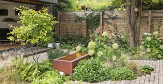 garden with a rust water feature