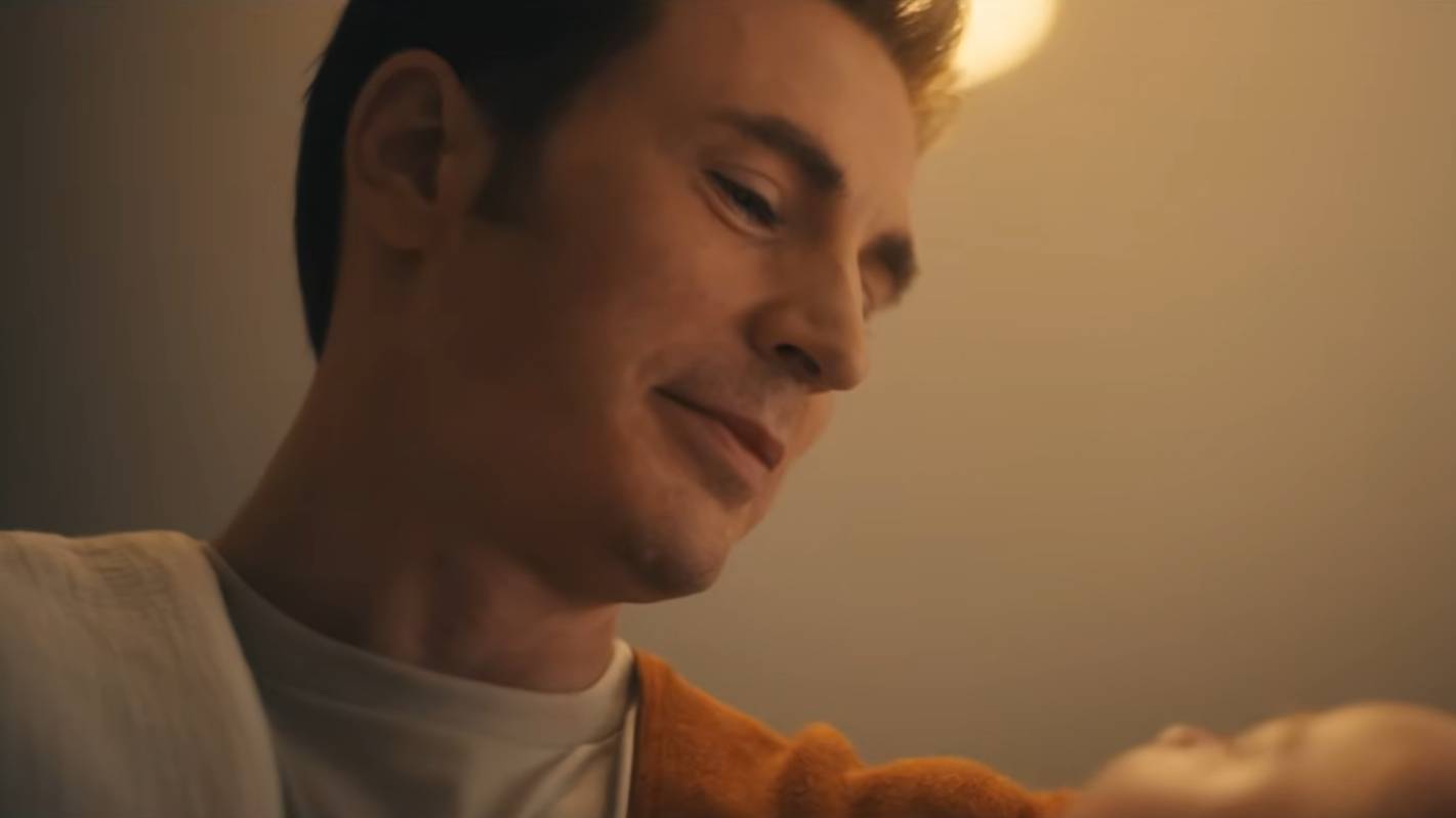 Chris Evans as Steve Rogers in Avengers: Doomsday, holding a baby