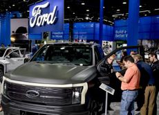 Ford EV trucks on display at an Auto Show