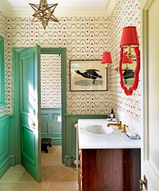 bathroom color ideas with patterned wallpaper and green door frame