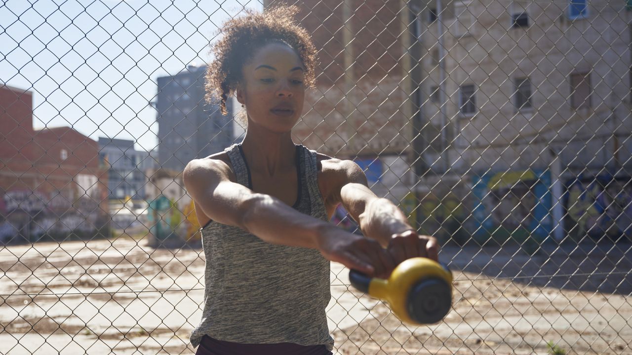 Woman doing a kettlebell swing