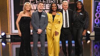 Vanna White, Chris Perfetti, Sheryl Lee Ralph, Pat Sajak and Janelle James smiling on the set for Celebrity Wheel of Fortune