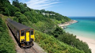 The train to St Ives passes the beach of Carbis Bay
