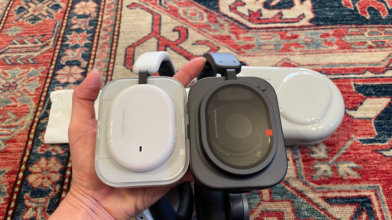 Nothing headphones arranged together, to show the different cases