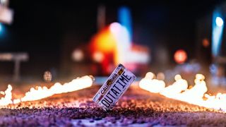 Back to the Future Fire tracks with Outatime license plate in the foreground