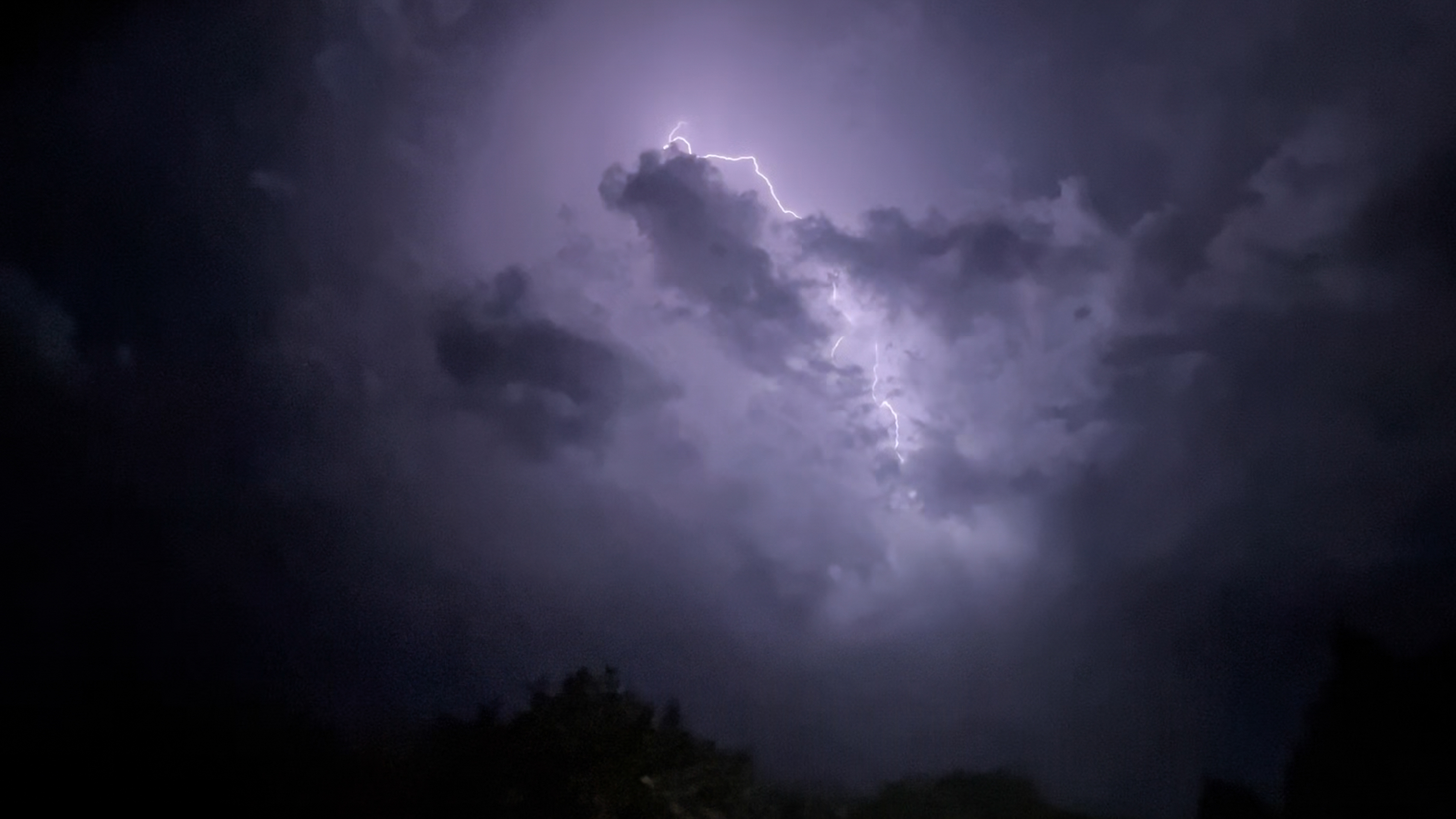 Lightning storm photos taken on an iPhone 13 Mini