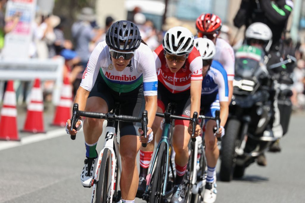 LR Namibias Vera Looser Austrias Anna Kiesenhofer Israels Omer Shapira Polands Anna Plichta and South Africas Carla Oberholzer unseen ride in a breakaway group as they lead the womens cycling road race of the Tokyo 2020 Olympic Games after the race start at Musashinonomori Park on the outskirts of Tokyo Japan on July 25 2021 Photo by MICHAEL STEELE POOL AFP Photo by MICHAEL STEELEPOOLAFP via Getty Images