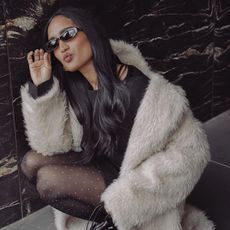 An image of @divrav polka-dot tights. 