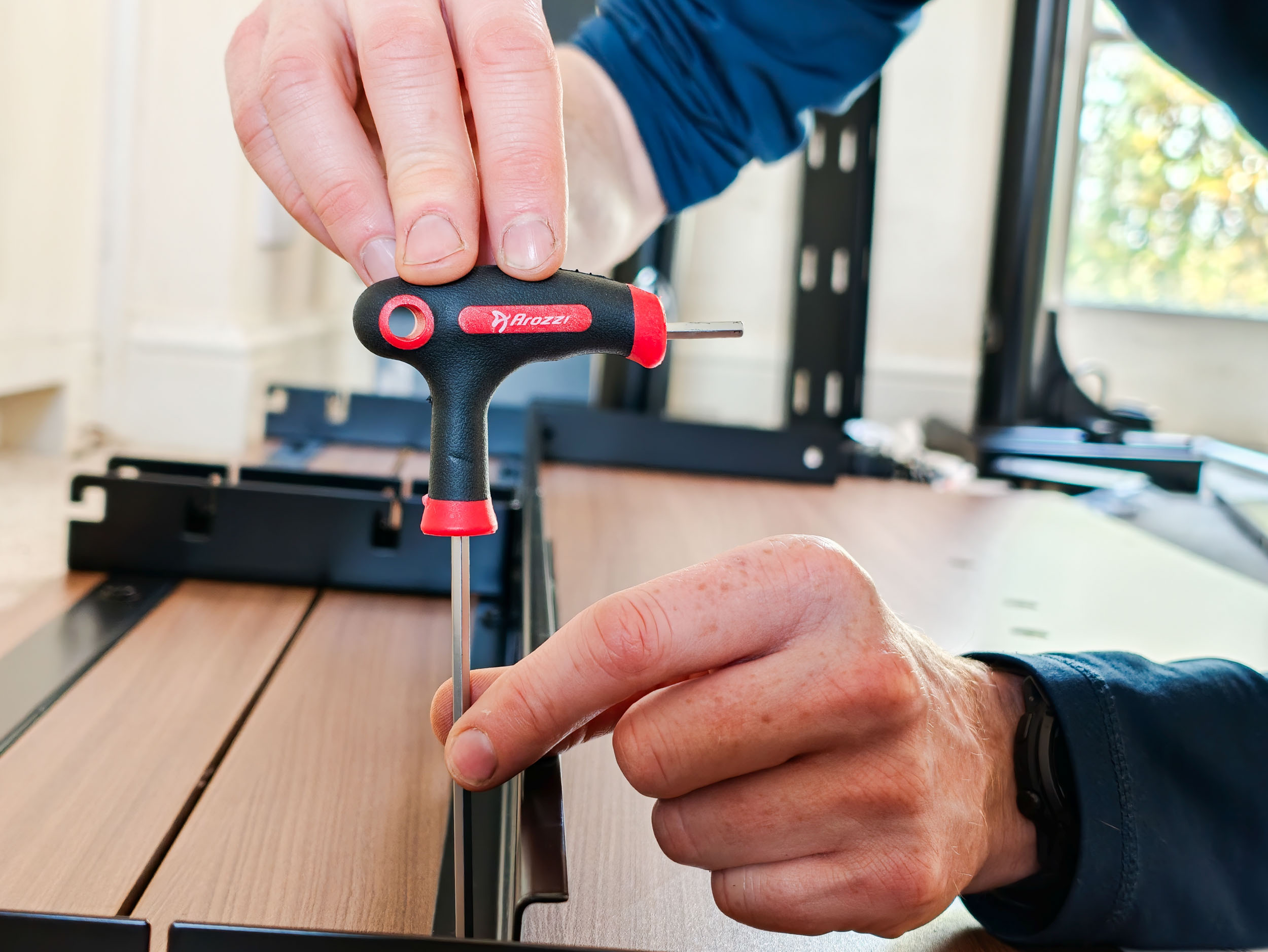Closeup of the hex key tool for the assembly of the Arozzi Arena Nordico Electric Standing Desk